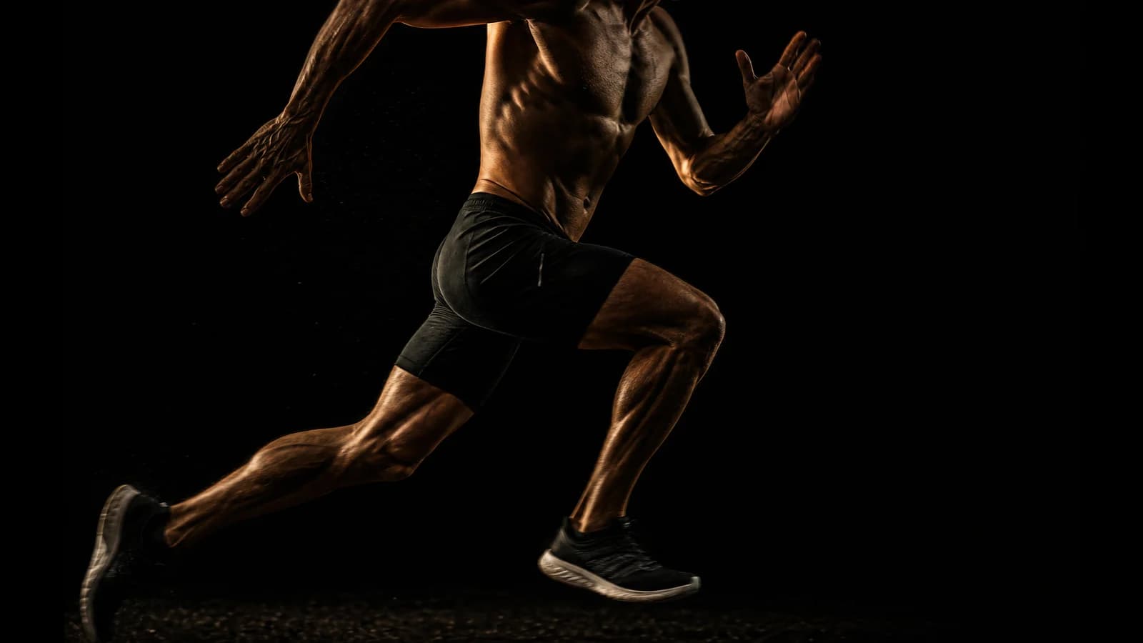 Lean athletic man sprinting at full speed